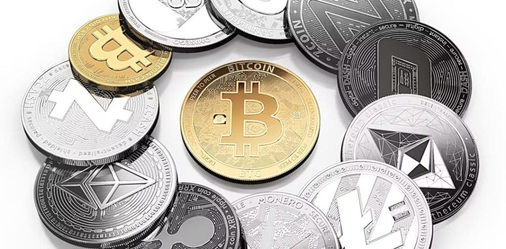 bitcoin at the center 1 - Digital Wager Wire Cluster of various cryptocurrency coins, led by a gold Bitcoin at center, with Ethereum, Ripple, and other coins surrounding it.
