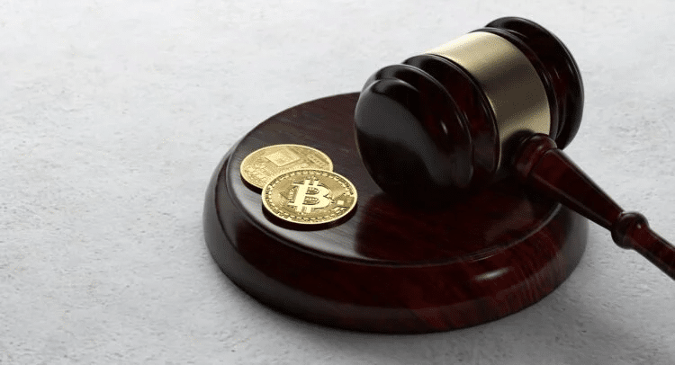 bitcoin justice - Digital Wager Wire Judge's gavel resting on a wooden sound block with two gold Bitcoin coins nearby, symbolizing cryptocurrency and legal matters
