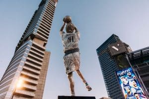 NBA Generic photo- pexels-emilio-gonzalez-663433162-27610097 1 - Digital Wager Wire Photo by Emilio González: https://www.pexels.com/photo/a-statue-of-a-basketball-player-in-front-of-tall-buildings-27610097/